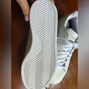 Women’s Adidas white leather sneakers
